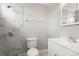 Bright bathroom features a tiled shower, a modern vanity, and ample lighting for a refreshing experience at 434 W 8Th St, Charlotte, NC 28202