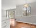 Dining area with bright windows and an adjoining view of the kitchen at 434 W 8Th St, Charlotte, NC 28202
