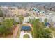 Expansive aerial view of a lakefront property with a modern home, long driveway, and serene surroundings at 4890 Rio De Luna None, Hickory, NC 28601