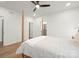 Spacious bedroom featuring light wood floors and a comfortable four-poster bed, great for relaxation at 4890 Rio De Luna None, Hickory, NC 28601