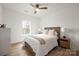 Inviting bedroom featuring wood floors, a cozy bed, and a large window, providing a serene and comfortable space at 4890 Rio De Luna None, Hickory, NC 28601