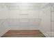 Walk-in closet featuring practical wire shelving, perfect for organizing clothes and accessories efficiently at 4890 Rio De Luna None, Hickory, NC 28601