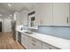 Bright, modern kitchen with white cabinets, stainless steel appliances, and a hexagon backsplash at 4890 Rio De Luna None, Hickory, NC 28601
