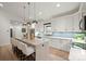 Bright, open kitchen featuring an island with seating, modern appliances, and elegant countertops at 4890 Rio De Luna None, Hickory, NC 28601