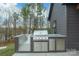 Outdoor kitchen area with a built-in grill and plenty of counter space for entertaining at 4890 Rio De Luna None, Hickory, NC 28601