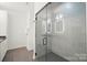 Modern bathroom featuring a frameless glass shower with sleek tile work and rainfall showerhead, creating a spa-like experience at 4890 Rio De Luna None, Hickory, NC 28601