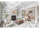 Open concept living room featuring a fireplace and a view into the dining area at 503 Dixter Ln, Charlotte, NC 28211