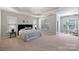 Large main bedroom suite with a sitting area and lots of natural light at 503 Dixter Ln, Charlotte, NC 28211