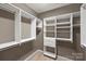 Large walk-in closet with custom shelving and ample storage space at 503 Dixter Ln, Charlotte, NC 28211
