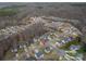 Wide aerial shot showing the home's location within a neighborhood at 5032 Meadow Woods Dr, Lowell, NC 28098