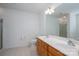 A bathroom with a double sink vanity, a toilet, and a glass-enclosed shower at 5032 Meadow Woods Dr, Lowell, NC 28098