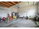 Spacious garage with storage area, ready for vehicles and projects at 5032 Meadow Woods Dr, Lowell, NC 28098