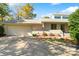 Charming home featuring a two-car garage, inviting front entrance, and well-maintained landscaping at 5101 Gamton Ct, Charlotte, NC 28226