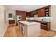 Beautiful kitchen with a large island, custom cabinetry, and modern stainless steel appliances at 5101 Gamton Ct, Charlotte, NC 28226