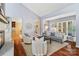 Cozy living room featuring a fireplace, comfortable seating, and large windows at 5101 Gamton Ct, Charlotte, NC 28226