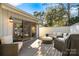 Inviting patio featuring outdoor seating, a grill, and sliding glass doors leading inside at 5101 Gamton Ct, Charlotte, NC 28226