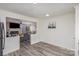 Open-concept living and dining area with neutral color palette and modern flooring at 604 White Oak Ct, Gastonia, NC 28056