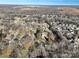 An aerial view showcases a neighborhood with single-Gathering homes and tree-lined streets on a sunny day at 624 Patricia Ave, Harrisburg, NC 28075