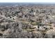 Wide aerial view of a neighborhood with single-Gathering homes surrounded by trees at 624 Patricia Ave, Harrisburg, NC 28075