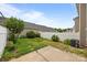 Well-maintained backyard with privacy fence, manicured landscaping and patio at 6846 Colonial Garden Dr, Huntersville, NC 28078