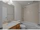 Bright bathroom with tub shower combo and marble vanity at 6846 Colonial Garden Dr, Huntersville, NC 28078