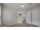 Cozy bedroom with wood-look flooring and neutral paint at 6846 Colonial Garden Dr, Huntersville, NC 28078