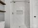 Modern bathroom featuring a tiled shower with a rainfall showerhead at 724 Merridale Dr, Charlotte, NC 28214