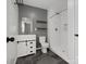 Contemporary bathroom featuring a tiled walk-in shower and a modern vanity at 724 Merridale Dr, Charlotte, NC 28214