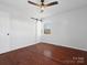Charming bedroom with hardwood floors and a sliding door at 724 Merridale Dr, Charlotte, NC 28214