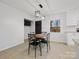 Bright dining area featuring a contemporary light fixture at 724 Merridale Dr, Charlotte, NC 28214