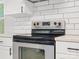 Updated kitchen features stainless steel appliances, stylish backsplash, and modern finishes at 724 Merridale Dr, Charlotte, NC 28214