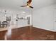 Spacious living room offering a combination of wood and tile flooring at 724 Merridale Dr, Charlotte, NC 28214