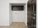 View of the utility room featuring built in cabinets for storage at 724 Merridale Dr, Charlotte, NC 28214