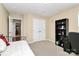 Neutral bedroom with desk, bookcase, and plush carpeting at 7343 Mill Ruins Sw Ave, Concord, NC 28025