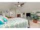 Large bedroom with a seating area, ceiling fan and plant at 7343 Mill Ruins Sw Ave, Concord, NC 28025
