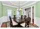 Elegant dining room with classic decor and ample natural light at 7343 Mill Ruins Sw Ave, Concord, NC 28025