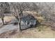 Birds eye view of a quaint home with a cozy porch and surrounding trees at 934 W Nc 150 Hwy, Lincolnton, NC 28092