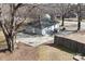 Aerial view highlighting the home's back exterior, spacious yard with basketball hoop, and convenient driveway at 934 W Nc 150 Hwy, Lincolnton, NC 28092