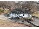 Aerial view highlighting the home's back exterior, spacious yard, and convenient driveway at 934 W Nc 150 Hwy, Lincolnton, NC 28092