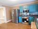 Updated kitchen features stainless steel appliances, sleek countertops, and modern cabinetry at 934 W Nc 150 Hwy, Lincolnton, NC 28092