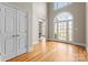 Welcoming foyer featuring pristine hardwood floors, double doors and soaring ceilings at 1025 Seminole Dr, Waxhaw, NC 28173