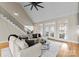 Bright living room with cathedral ceiling, hardwood floors, and French doors to the outside patio at 1025 Seminole Dr, Waxhaw, NC 28173