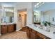 Spacious bathroom with dual vanities, ample cabinet space, and neutral decor offering a functional and stylish space at 1005 Forbishire Dr, Matthews, NC 28104