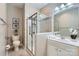 Bathroom featuring a glass shower, neutral wall coloring, and a white vanity at 1005 Forbishire Dr, Matthews, NC 28104