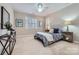 Bedroom featuring natural light, neutral walls, a ceiling fan and carpeted floors at 1005 Forbishire Dr, Matthews, NC 28104