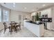 Kitchen and dining room featuring an island with dark countertops and stainless steel appliances at 1005 Forbishire Dr, Matthews, NC 28104
