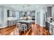 Spacious kitchen features gray cabinets, quartz countertops, and stainless-steel appliances at 1005 Forbishire Dr, Matthews, NC 28104
