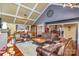 Bright living room with vaulted ceiling, recessed lights, hardwood floors, and comfortable furniture throughout at 108 Outside Loop Ln, Mooresville, NC 28117