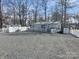 Exterior of the house and yard including shed and deck at 110 Shawnee Trl, Mount Gilead, NC 27306