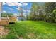 Spacious backyard featuring a wooden deck and ample green space at 117 Lippard St, Statesville, NC 28677
